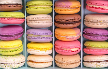 Assorted colorful macaroons in a box