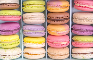 Assorted colorful macaroons in a box