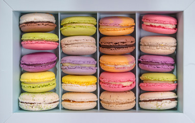 Assorted colorful macaroons in a box