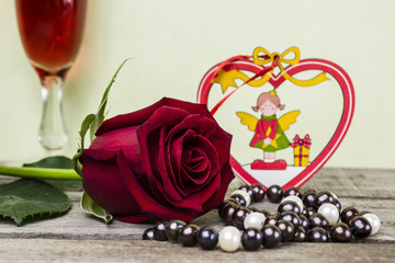 Rose and pearls, wine