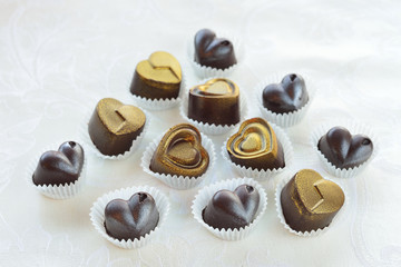 chocolates in a heart shape made of milk and dark chocolate with
