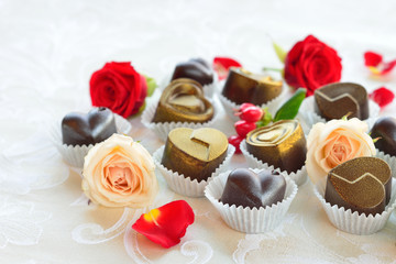 chocolates in a heart shape made of milk and dark chocolate with
