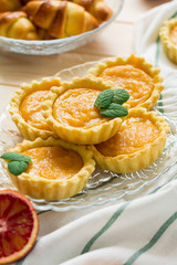 Homemade tartlets with citrus curd