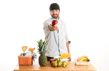 cook man happy with apple.