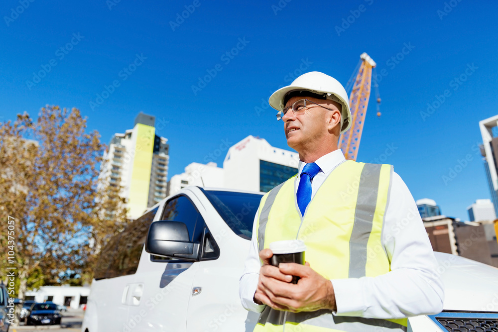 Wall mural engineer builder at construction site