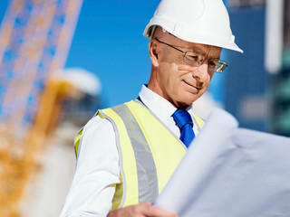 Engineer builder at construction site