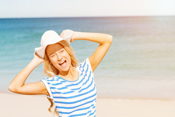 Young woman relaxing on the beach