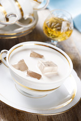 Fototapeta na wymiar Iced tea with milk and brandy