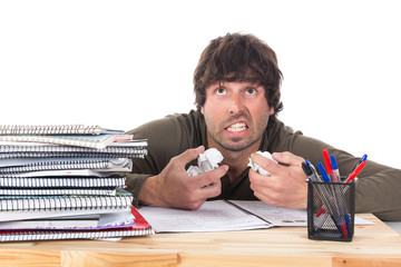hysteric student at table with a lot of books