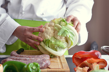 Chef cutting vegetables