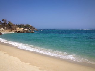 Fototapeta na wymiar Beautiful and tranquil Caribbean beach in Colombia
