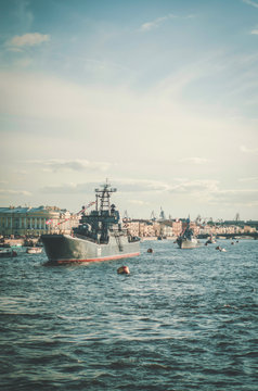 ST. PETERSBURG, RUSSIA: The view on historical warship in the Neva river panorama on the Day of the Navy, Russian celebration from the embankment in Saint Petersburg, Russia, July 26, 2015