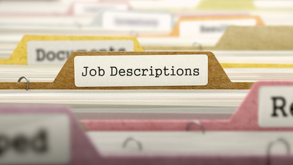File Folder Labeled as Job Descriptions in Multicolor Archive. Closeup View. Blurred Image. 3D Render. - obrazy, fototapety, plakaty