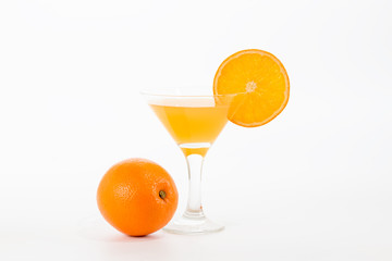 natural juice from the orange into a glass