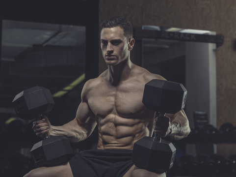 Athlete with dumbbells