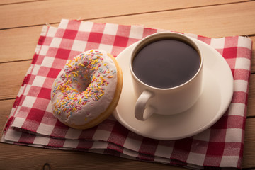 coffee cup and donuts