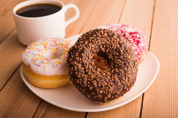 coffee cup and donuts
