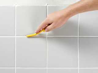 TILING  GROUTING AND SMOOTHING A WALL