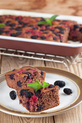 Gingerbread cake with mulberries and red currants