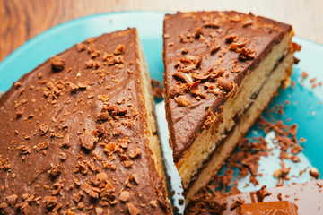 sweet cake and chocolate chips on a blue plate