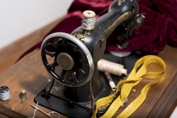 antique sewing machine in a study tailoring.