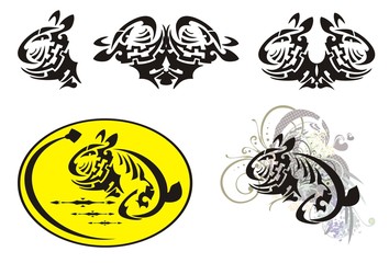 Rabbit and egg - Easter symbols in tribal style. The decorative stylized baby rabbit head, decorative yellow Easter egg and rabbit in a retro style with floral elements