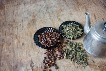 Coffee beans and green tea leaves 