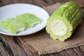 Fresh bitter gourd on sackcloth
