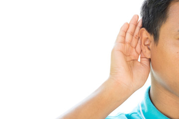 Businessman holds his hand near his ear and listening something