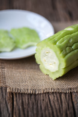 Fresh bitter gourd on sackcloth