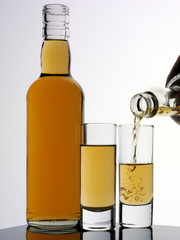 POURING JAMAICAN RUM