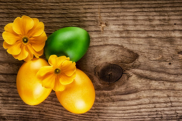 Easter eggs over wooden background