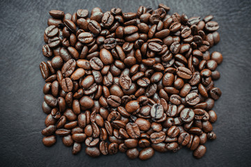 Coffee beans on background