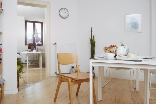 Laid breakfast table in a flat