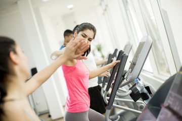 Fototapeta premium Young people training in the gym
