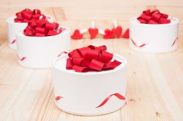 Gift boxes on wooden board