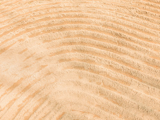 abstract curve lines write on the sand