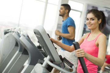 Young multiracial people training in the gym