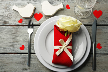 Festive table setting for Valentines Day on wooden background