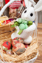 Fototapeta na wymiar Decoupage Easter eggs with Easter bunny.