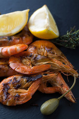 Grilled shrimp in shell with lemon
