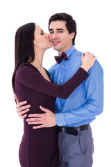 happiness concept - happy young woman kissing her husband isolat