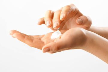 Beautiful woman's hands with  care cream on the palm.Skincare concept