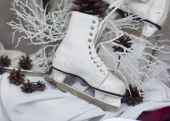 White skates, still life. Skates for skating on ice on the background. 