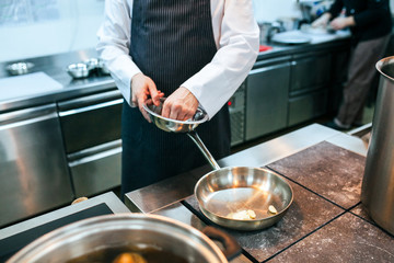 Chef preparing food in the kitchen