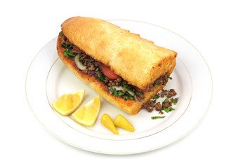 Traditional Turkish cuisine, Tantuni with loaf bread.
