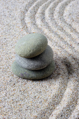 Fototapeta na wymiar Stacked zen stones selective focus