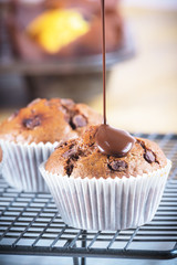 Muffins topped with warm chocolate