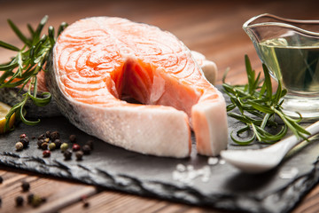 Fresh salmon on old wood