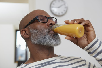 Man drinking smoothie